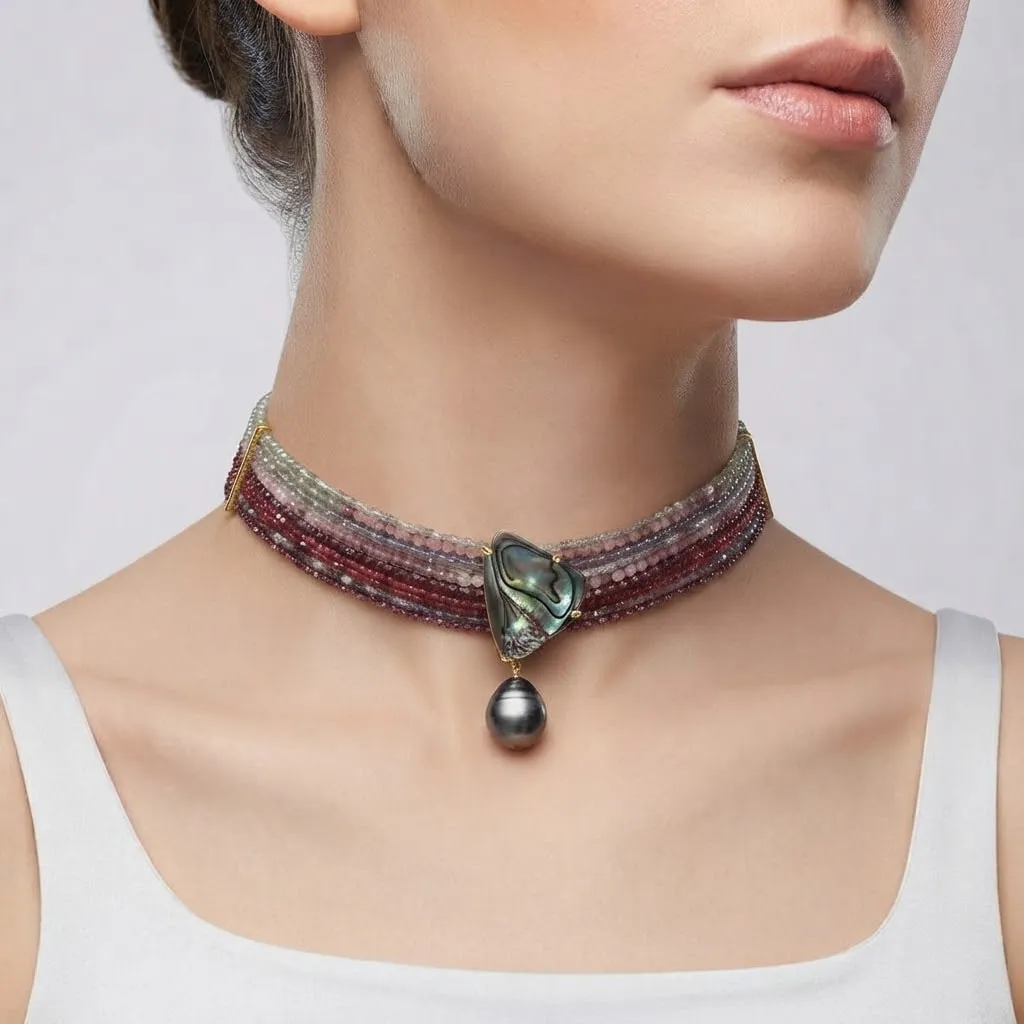 Burgundy bead choker with an abalone and pearl centrepiece, worn