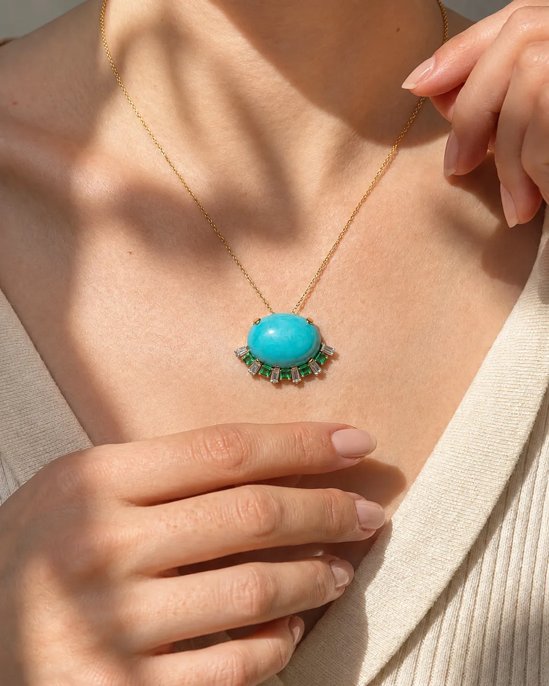 Turquoise pendant worn in soft afternoon light